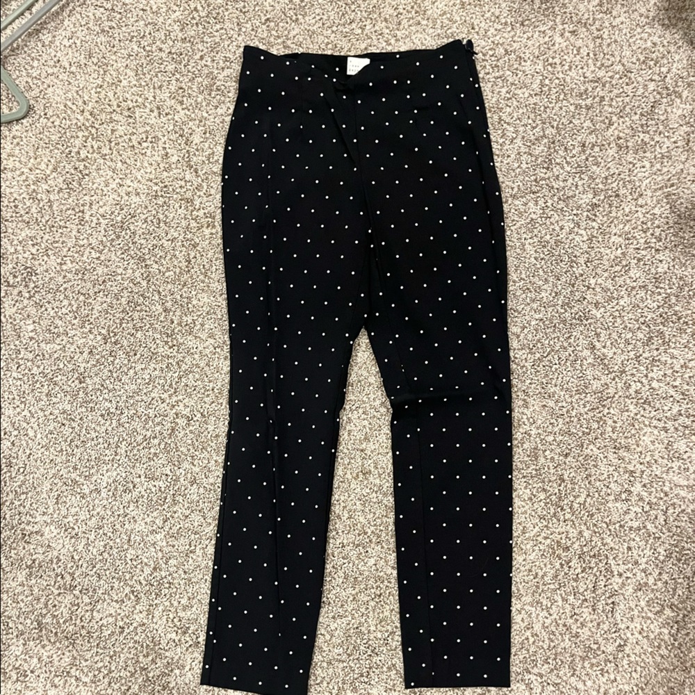 Black and white polka dot slacks